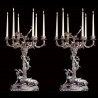 Pair of silver-plated bronze candelabra with "hunting" decoration
