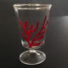 Wine glass with red coral strand 